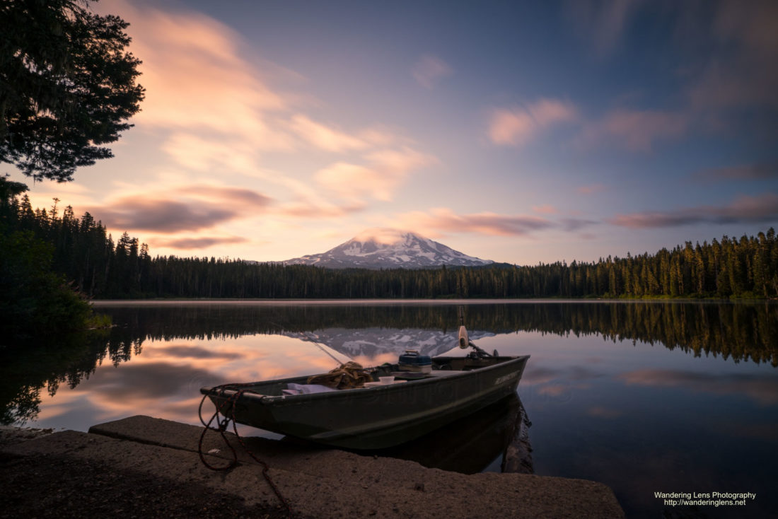 Fishing boat docked on Tahklakh Lake under Mt. Adams