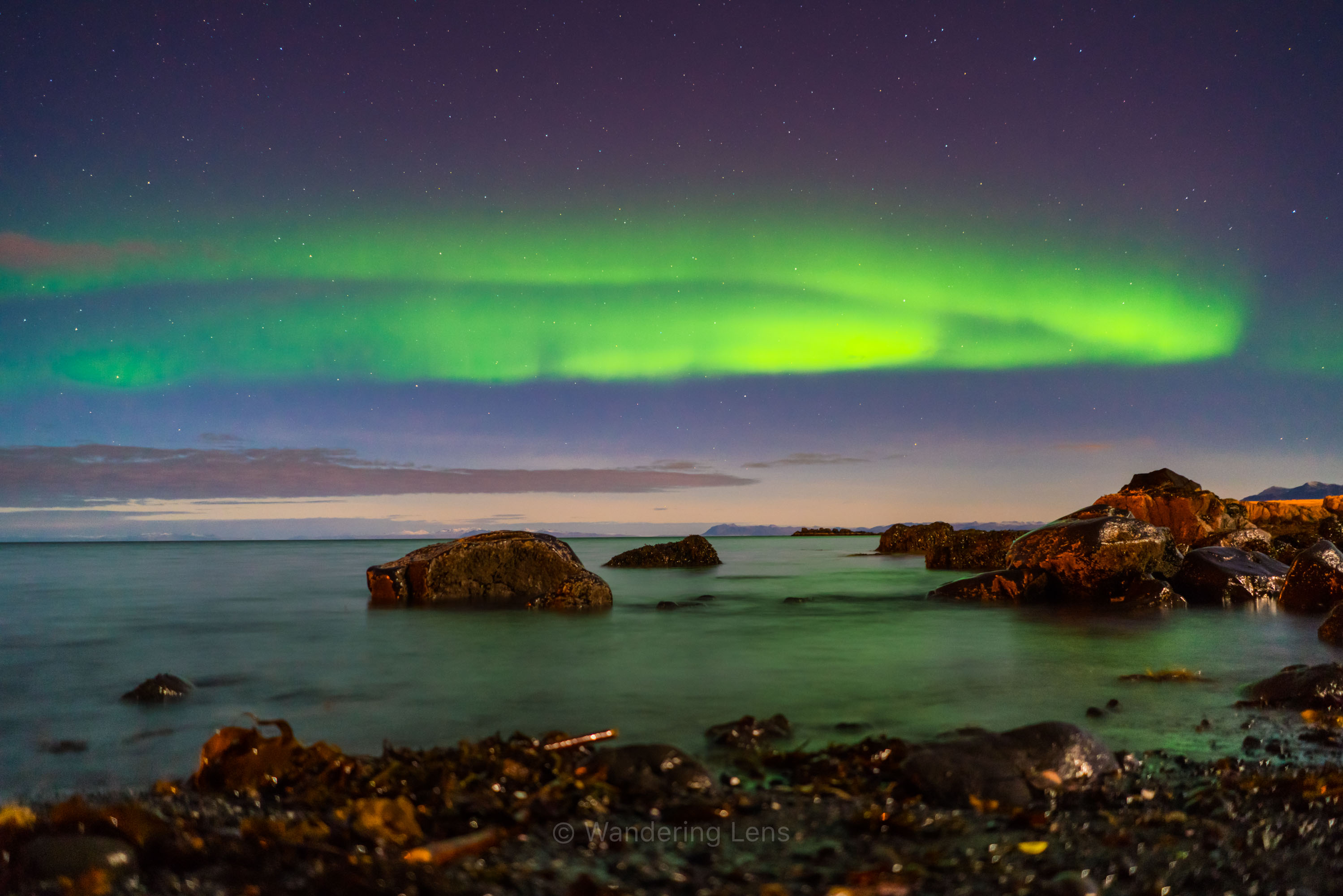 Northern lights over the ocean